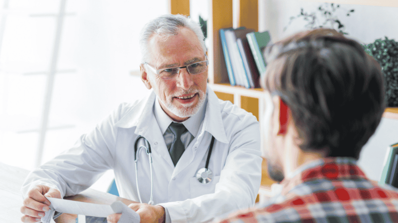 Doctor-smiling-to-patient