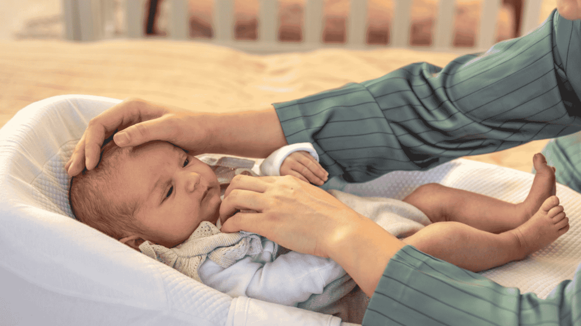 mom is soothing her baby