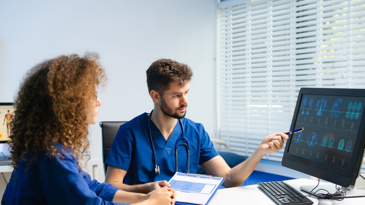 Doctor showing patient test results