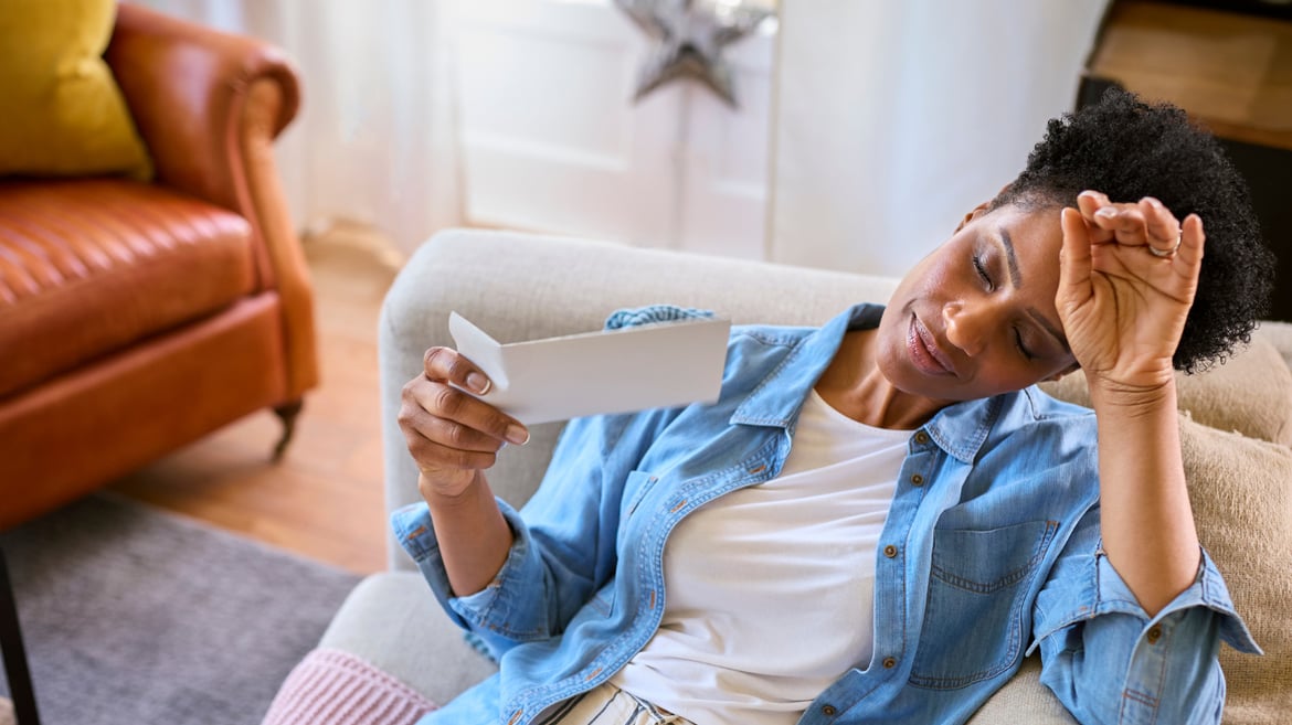 Woman dealing with menopause having a heat flash