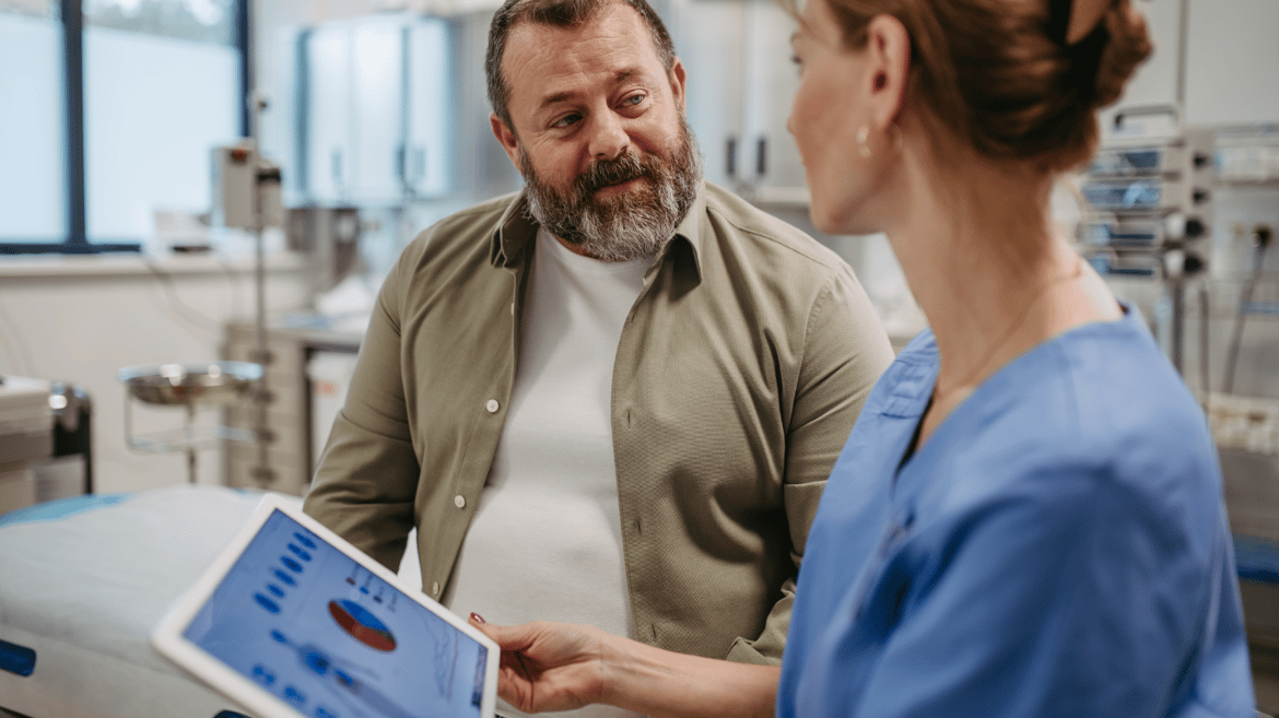 Female doctor consulting with overweight patient