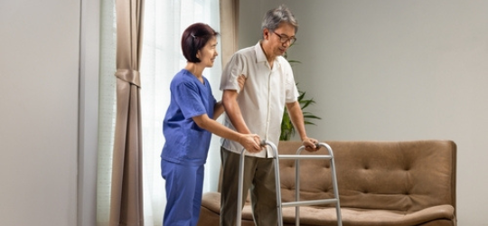Caregiver takecare older man that having Sarcopenia
