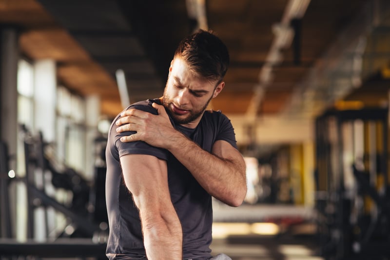 A man with muscle pain