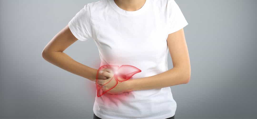 Woman Suffering from Liver Pain on Grey Background