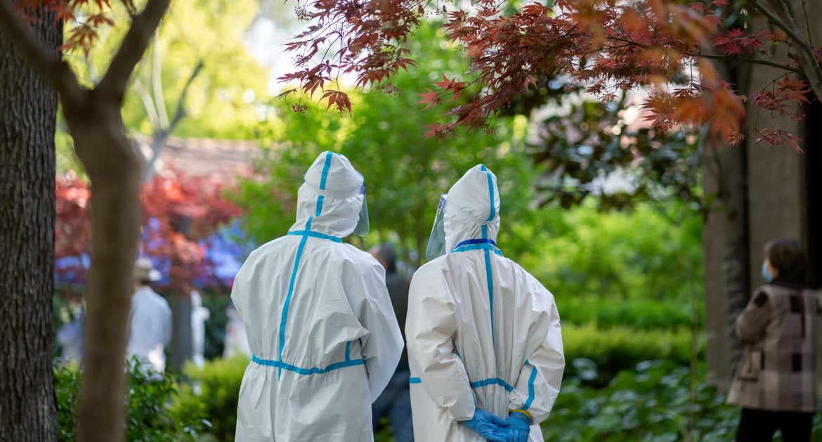 Healthcare workers in China in hazmat suits