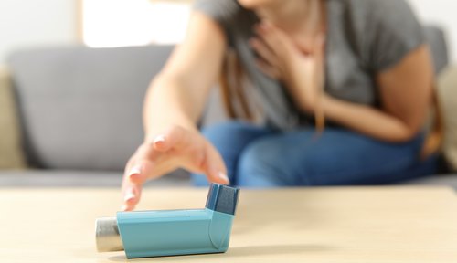 A girl picking Inhaler