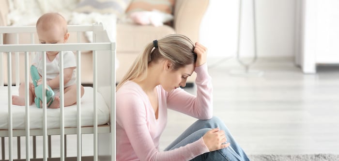 Mother suffering from PND with baby