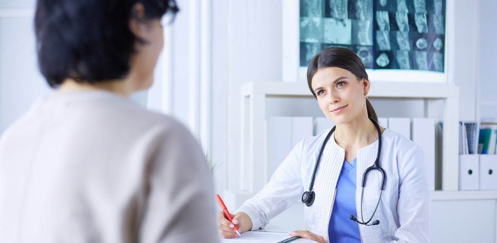 Functional Medicine Doctor talking to patient