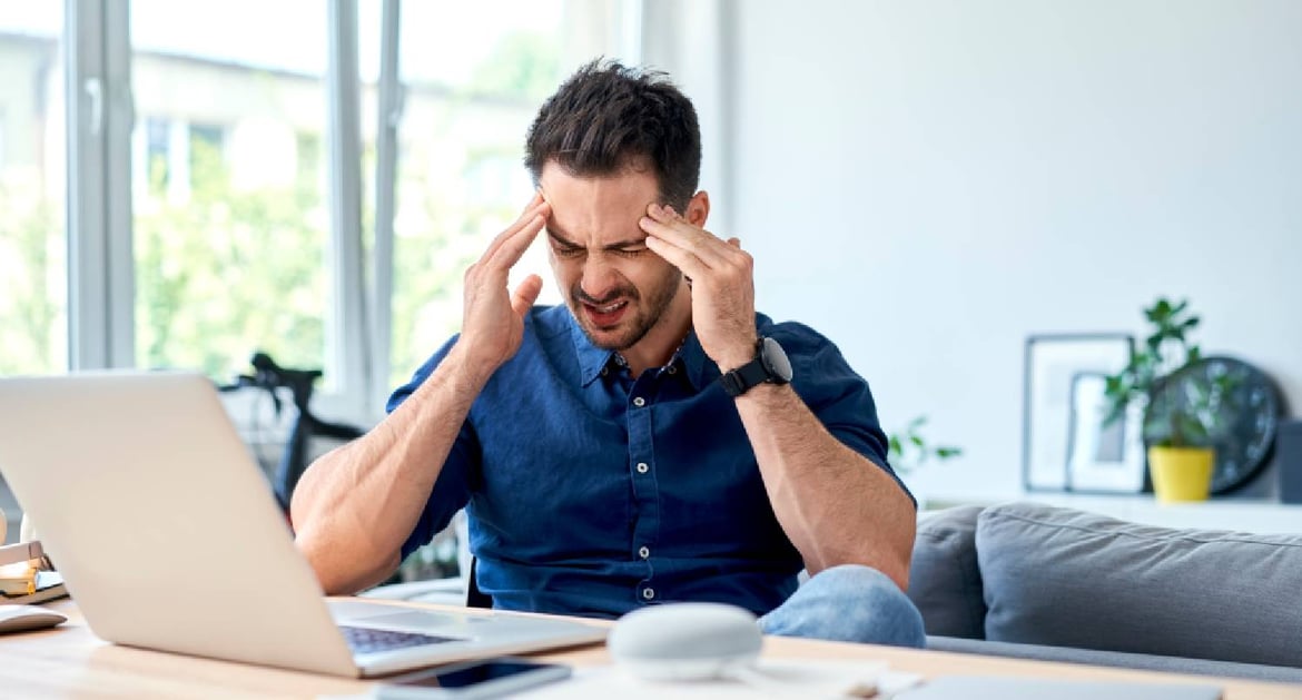 young man with migraines