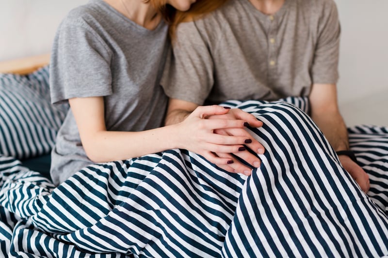 A pair of couple holding hands 