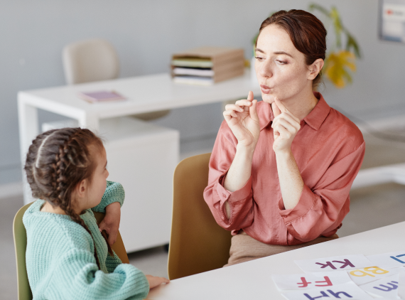 speech therapist doctor with child