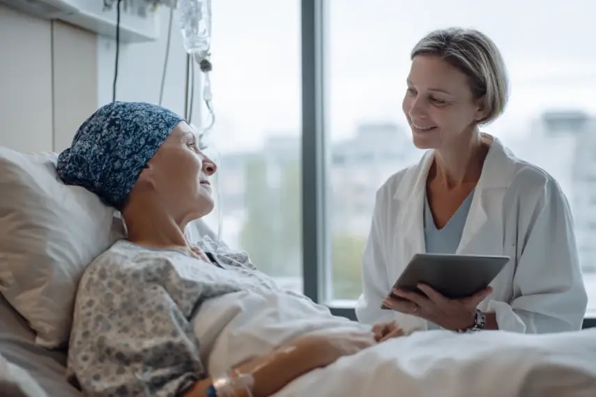 img-oncology-doctor-with-patient