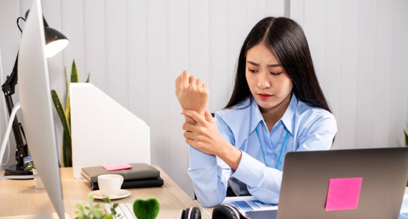 A young woman with mommy wrist