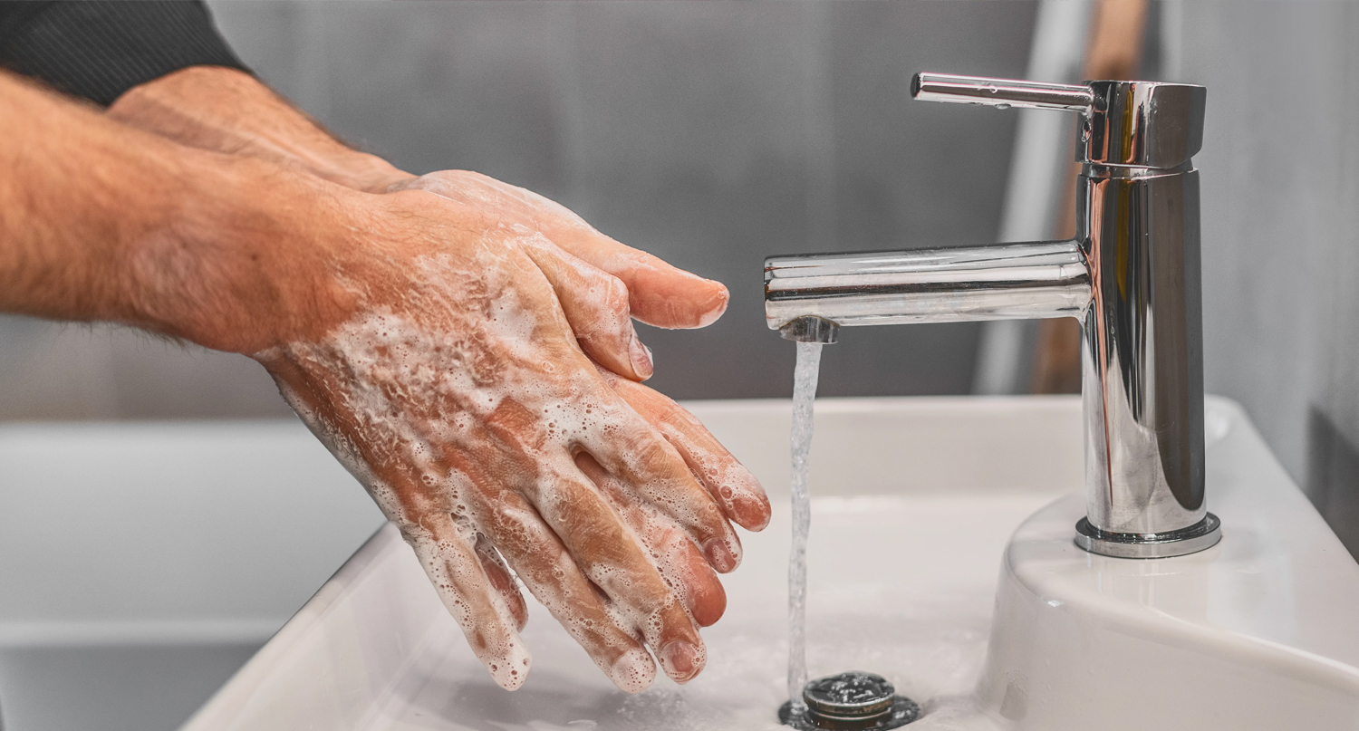 washing hands in a sink